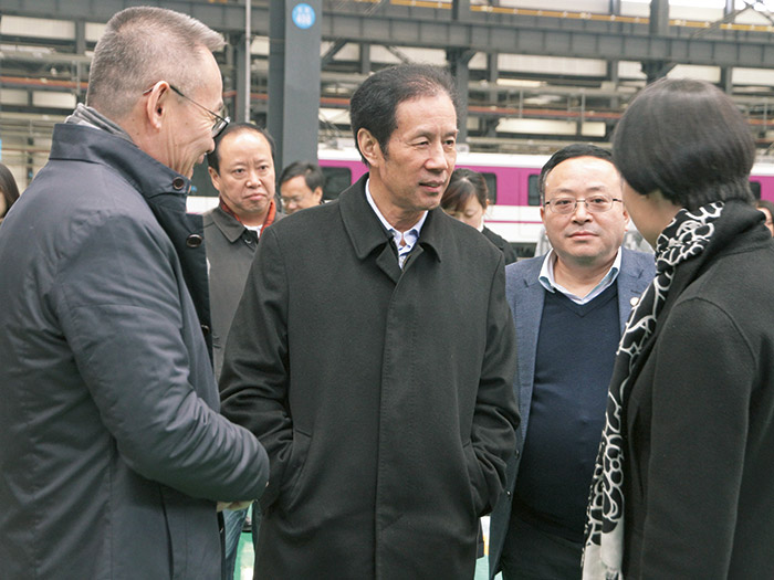  原四川省人大副主任陈光志一行莅临四川发展亚新（中国）股份调研指导工作,公司董事长肖光辉陪同